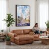 04 - Framed Las Vegas Watercolor Canvas Print - Woman Knitting on leather couch - Vertical.jpg