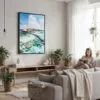 04 - Framed Maldives Watercolor Canvas Print - Woman reading in modern Living Room - Vertical.jpg