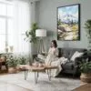 04 - Framed Mount Rainier - Watercolor Canvas Print - Woman reading in Boho Living Room - Vertical.jpg