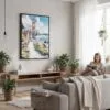 04 - Framed San Francisco Golden Gate Bridge - Watercolor Canvas Print - Woman reading in modern Living Room - Vertical.jpg
