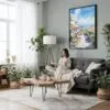 04 - Framed Santa Barbara California Watercolor Canvas Print - Woman reading in Boho Living Room - Vertical.jpg