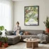 04 - Framed Savannah Georgia Watercolor Canvas Print - Woman Knitting on grey couch - Vertical.jpg