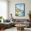 04 - Framed Sicily Italy Watercolor Canvas Print - Woman Knitting on grey couch - Vertical.jpg