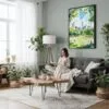 04 - Framed Summer in New York Central Park Watercolor Canvas Print - Woman reading in Boho Living Room - Vertical.jpg