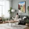 04 - Framed Zion Canyon Watercolor Canvas Print - Woman reading in Boho Living Room - Vertical.jpg