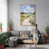 04 - Jackson Hole watercolor Canvas Print with Natural Floater Frame - Woman Knitting on grey couch - Vertical.jpg