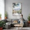 04 - Medellin Colombia Watercolor Canvas Print with Natural Floater Frame - Woman Knitting on grey couch - Vertical.jpg