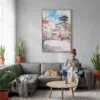 04 - Osaka Castle Japan - Watercolor Canvas Print with Natural Floater Frame - Woman Knitting on grey couch - Vertical.jpg