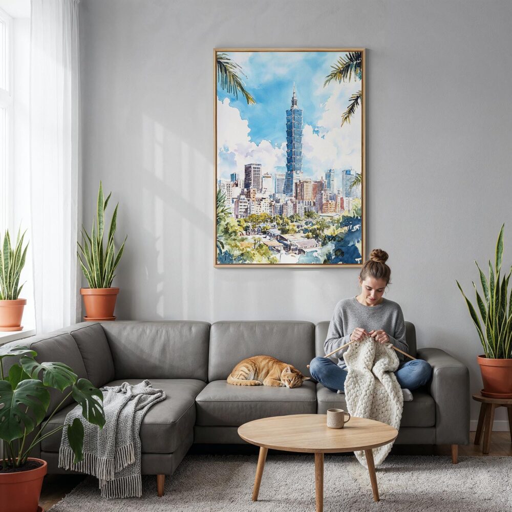 04 - Taipei Watercolor Canvas Print with Natural Floater Frame - Woman Knitting on grey couch - Vertical.jpg 04 - Taipei Watercolor Canvas Print with Natural Floater Frame - Woman Knitting on grey couch - Vertical.jpg