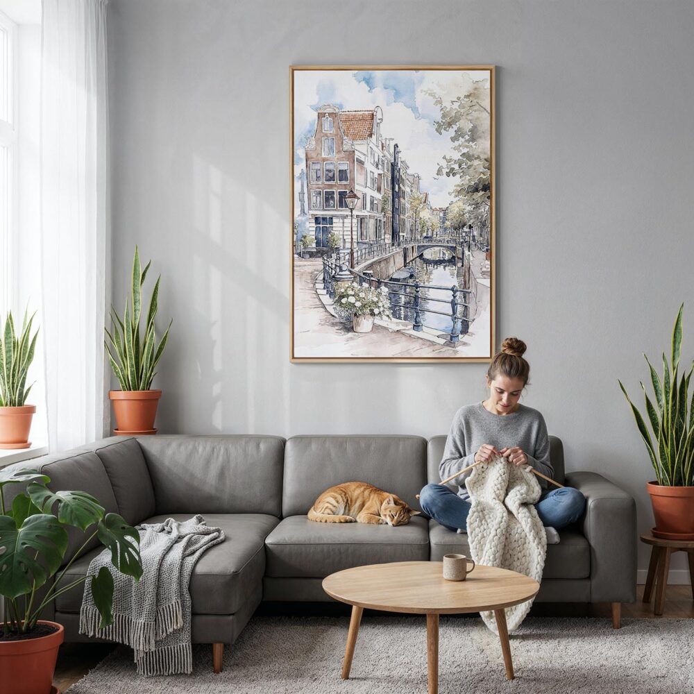 05 - Amsterdam - Watercolor 1 Canvas Print with Natural Floater Frame - Woman Knitting on grey couch - Vertical.jpg 05 - Amsterdam - Watercolor 1 Canvas Print with Natural Floater Frame - Woman Knitting on grey couch - Vertical.jpg