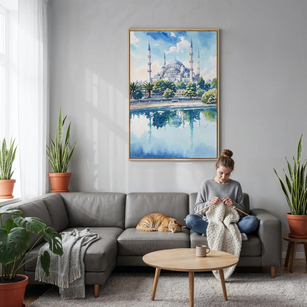 05 - Blue Mosque Watercolor Canvas Print with Natural Floater Frame - Woman Knitting on grey couch - Vertical.jpg 05 - Blue Mosque Watercolor Canvas Print with Natural Floater Frame - Woman Knitting on grey couch - Vertical.jpg