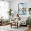 05 - Framed Amritsar Golden Temple Watercolor Canvas Print - Woman reading on couch - Vertical.jpg