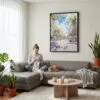 05 - Framed Barcelona Las Ramblas Watercolor Canvas Print - Woman Knitting on grey couch - Vertical.jpg