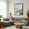 05 - Framed Cappadocia Turkey Watercolor Canvas Print - Woman Knitting on grey couch - Vertical.jpg