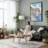 05 - Framed Cinque Terre Watercolor Canvas Print - Woman reading in Boho Living Room - Vertical.jpg
