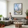 05 - Framed Dallas Texas Watercolor Canvas Print - Woman Knitting on grey couch - Vertical.jpg