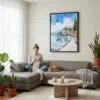 05 - Framed Lake Garda Italy Watercolor Canvas Print - Woman Knitting on grey couch - Vertical.jpg