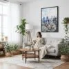 05 - Framed Montreal Skyline Watercolor Canvas Print - Woman reading on couch - Vertical.jpg