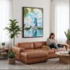 05 - Framed Orlando Florida Watercolor Canvas Print - Woman Knitting on leather couch - Vertical.jpg
