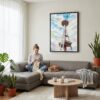 05 - Framed Seattle Space Needle Watercolor Canvas Print - Woman Knitting on grey couch - Vertical.jpg