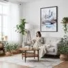 05 - Framed White Christmas Central Park New York Watercolor Canvas Print - Woman reading on couch - Vertical.jpg