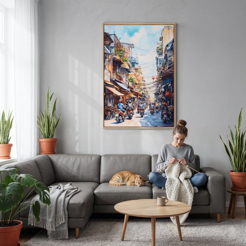 05 - Hanoi Old Quarter Watercolor Canvas Print with Natural Floater Frame - Woman Knitting on grey couch - Vertical.jpg 05 - Hanoi Old Quarter Watercolor Canvas Print with Natural Floater Frame - Woman Knitting on grey couch - Vertical.jpg