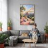 05 - Sedona Arizona Watercolor Canvas Print with Natural Floater Frame - Woman Knitting on grey couch - Vertical.jpg
