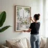 05 - Woman Hanging Framed Cozy Paris Cafe Streetscene with Eiffel Tower Watercolor@2x Art Print - Vertical.jpg