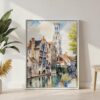 06 - Bruges Belgium Watercolor Canvas Print with White Floater Frame - Standing on Floor - Vertical.jpg