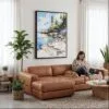 06 - Framed Acadia National Park Watercolor Canvas Print - Woman Knitting on leather couch - Vertical.jpg