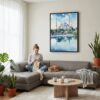 06 - Framed Blue Mosque Watercolor Canvas Print - Woman Knitting on grey couch - Vertical.jpg