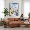 06 - Framed Cappadocia Turkey Watercolor Canvas Print - Woman Knitting on leather couch - Vertical.jpg