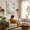 06 - Framed Cute Frog in Japanese Bathtub Illustration - 井の中の蛙大海を知らず Art Print - In Bohi Living Room with Woman reading - Vertical.jpg