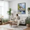 06 - Framed Lauterbrunnen Switzerland Watercolor Canvas Print - Woman reading on couch - Vertical.jpg
