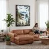 06 - Framed Olympic National Park Watercolor Canvas Print - Woman Knitting on leather couch - Vertical.jpg