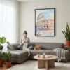 06 - Framed Rome Colosseum Watercolor Canvas Print - Woman Knitting on grey couch - Vertical.jpg
