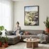 06 - Framed Theodore Roosevelt National Park Watercolor Canvas Print - Woman Knitting on grey couch - Vertical.jpg