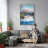 06 - Lake Clark National Park Watercolor Canvas Print with Natural Floater Frame - Woman Knitting on grey couch - Vertical.jpg