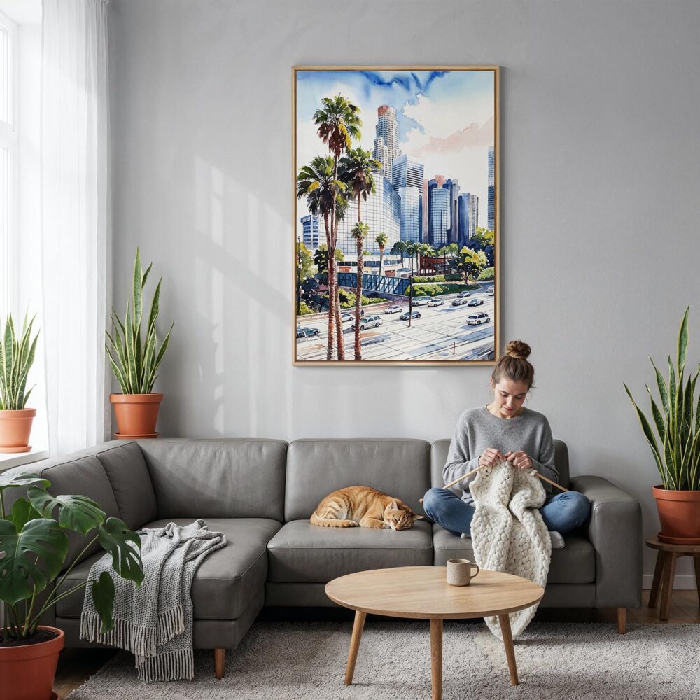 06 - Los Angeles Downtown Watercolor Canvas Print with Natural Floater Frame - Woman Knitting on grey couch - Vertical.jpg 06 - Los Angeles Downtown Watercolor Canvas Print with Natural Floater Frame - Woman Knitting on grey couch - Vertical.jpg