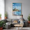 06 - Montauk lighthouse Long Island Watercolor Canvas Print with Natural Floater Frame - Woman Knitting on grey couch - Vertical.jpg