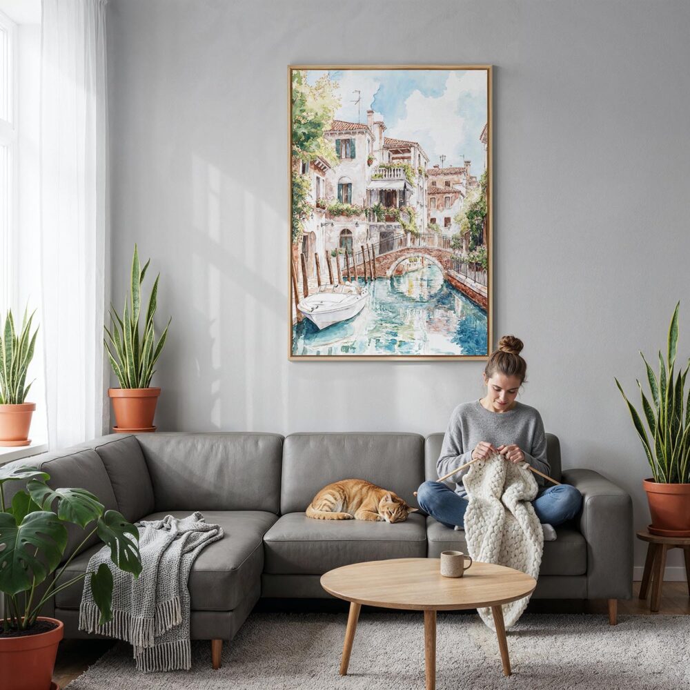 06 - Venice Canal - Watercolor Canvas Print with Natural Floater Frame - Woman Knitting on grey couch - Vertical.jpg 06 - Venice Canal - Watercolor Canvas Print with Natural Floater Frame - Woman Knitting on grey couch - Vertical.jpg