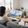 02 - A Woman Holding A Framed Zermatt Watercolor - Horizontal Art Print.jpg