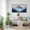 02 - Framed Misty Mountains Watercolor - Panorama Canvas Print - Woman Knitting on Sofa.jpg