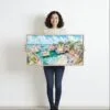 02 - Framed Portugal Algarve Watercolor - Panorama Canvas Print - Woman in front of blank wall.jpg