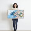 02 - Framed Positana Amalfi Coast Watercolor - Panorama Canvas Print - Woman in front of blank wall.jpg