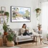 03 - Framed Medellin Watercolor - Horizontal Canvas Print - Boho Living Room with Woman reading.jpg