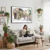 04 - Framed Hoi An Vietnam Watercolor - Horizontal Canvas Print - Boho Living Room with Woman reading.jpg