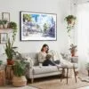 04 - Framed Key West Florida Duval Street Watercolor - Horizontal Canvas Print - Boho Living Room with Woman reading.jpg