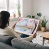 05 - A Woman Holding A Framed Hiroshima Japan Watercolor - Horizontal Art Print.jpg