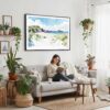05 - Framed Inishowen Ireland Watercolor - Horizontal Canvas Print - Boho Living Room with Woman reading.jpg